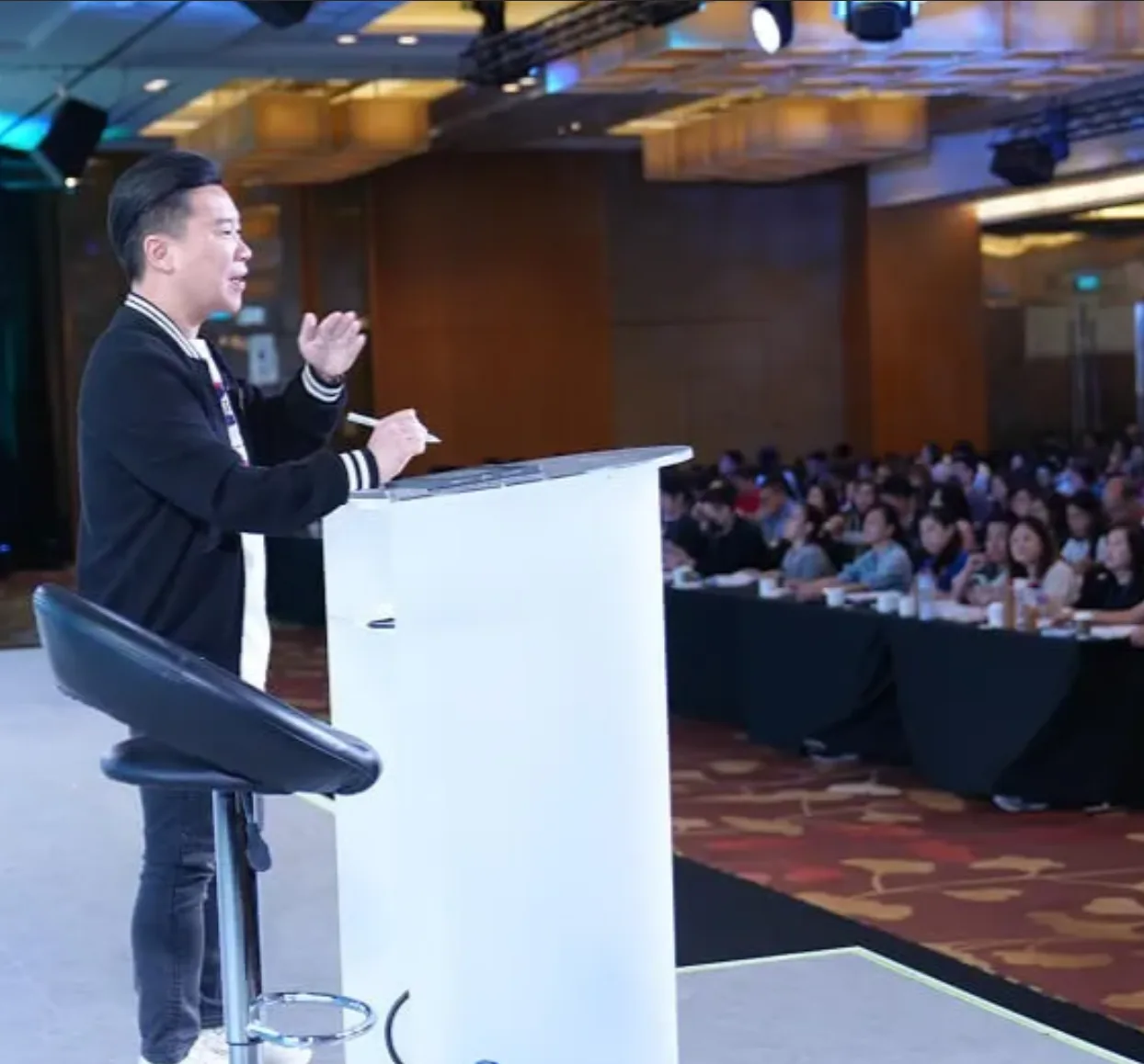 Kelvin Fong speaking at a Property Wealth System masterclass to a full room